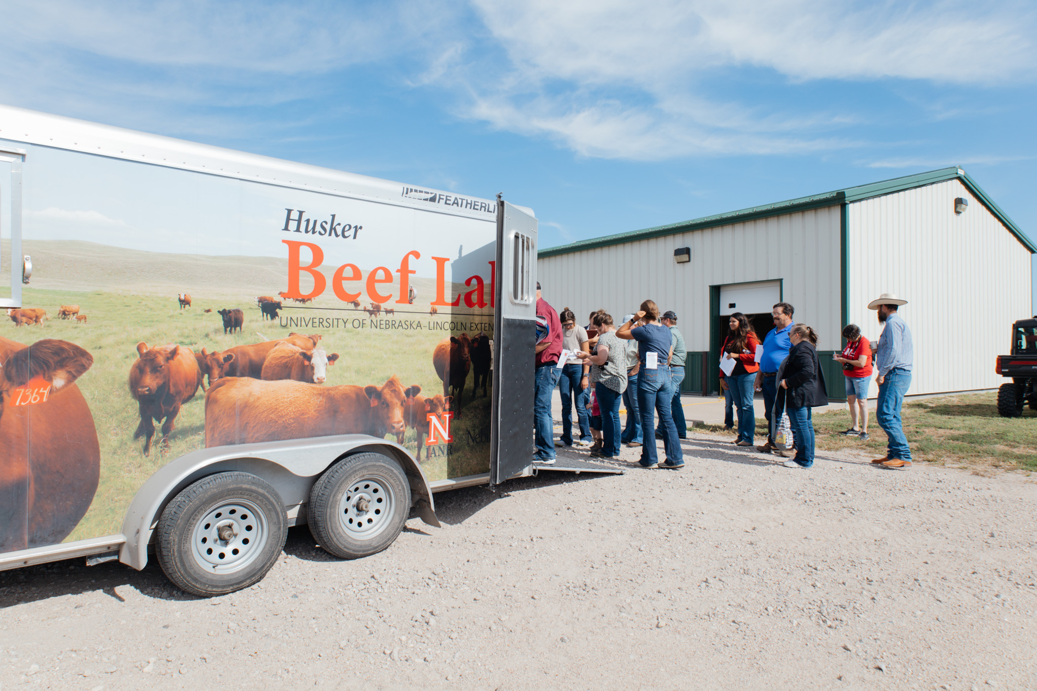 Crowd gathers around beef lab.